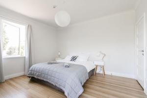 Letto o letti in una camera di The Pear Orchard Lodge