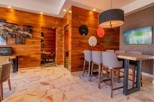 TV a/nebo společenská místnost v ubytování Hotel Lucerna Ciudad Juarez