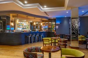 Lounge nebo bar v ubytování Hotel Lucerna Ciudad Juarez