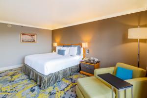 Postel nebo postele na pokoji v ubytování Hotel Lucerna Ciudad Juarez