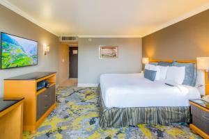 Postel nebo postele na pokoji v ubytování Hotel Lucerna Ciudad Juarez