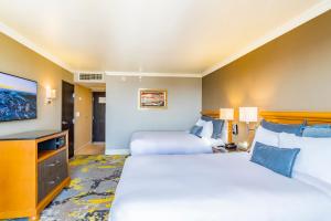 Postel nebo postele na pokoji v ubytování Hotel Lucerna Ciudad Juarez