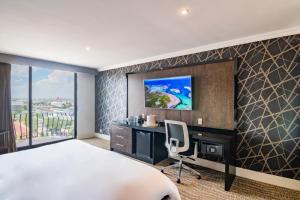 TV a/nebo společenská místnost v ubytování Hotel Lucerna Ciudad Juarez
