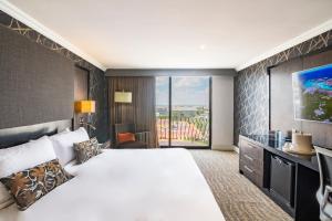 Postel nebo postele na pokoji v ubytování Hotel Lucerna Ciudad Juarez + 33 fotografií