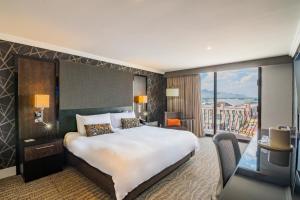 Postel nebo postele na pokoji v ubytování Hotel Lucerna Ciudad Juarez