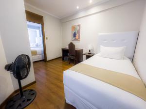 Postel nebo postele na pokoji v ubytování Domani Hotel Boutique