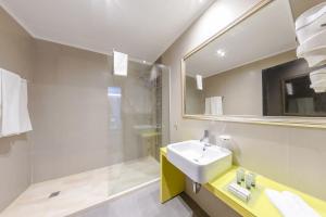 Koupelna v ubytování Hotel Studio