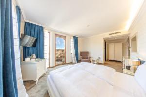 Postel nebo postele na pokoji v ubytování Hotel Studio
