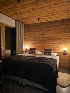 Postel nebo postele na pokoji v ubytování Apartmaji štAla