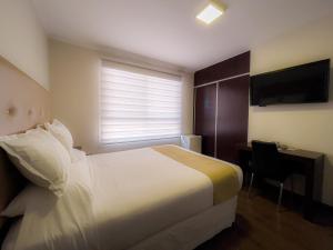 Postel nebo postele na pokoji v ubytování Domani Hotel Boutique