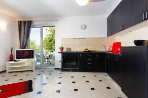 Kuchyň nebo kuchyňský kout v ubytování Malinska Apartment 15