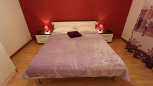 En eller flere senge i et værelse på Apartment in Malinska 40