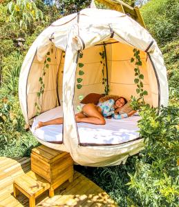 Letto o letti in una camera di Levit Glamping - Hotel Guatapé Peñol