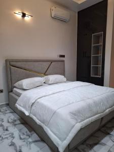 Postel nebo postele na pokoji v ubytování Deosea Apartment