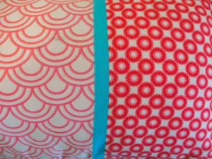 two pieces of fabric with red and white patterns at LIMOGES,LA vue, 7e ciel, ascenseur ! in Limoges