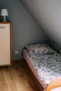 Postel nebo postele na pokoji v ubytování Jacek i Agatka