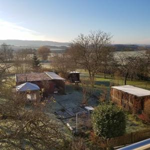 an aerial view of two old barns in a field at Sonnenhaus Oppenhausen in Boppard