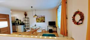 Kuchyň nebo kuchyňský kout v ubytování Atom apartment