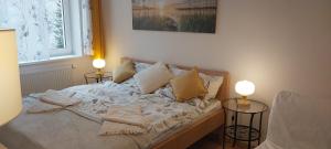 Postel nebo postele na pokoji v ubytování Atom apartment