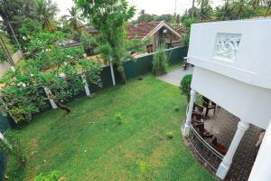 Fotografie z fotogalerie ubytování Green Gate House Rooms v destinaci Kochchikade