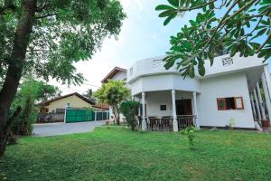 Fotografie z fotogalerie ubytování Green Gate House Rooms v destinaci Kochchikade