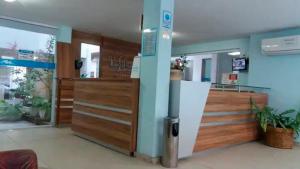 a hospital room with a lobby with a door at Apartamento em Cabo Frio - Praia do Forte in Cabo Frio