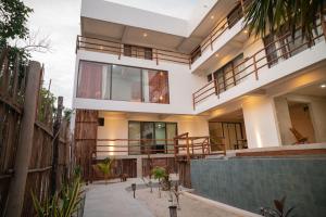 Balkón nebo terasa v ubytování La Familia Casa and Suites