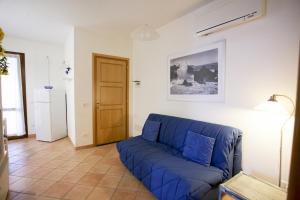 A seating area at Appartamenti Bilo Sofi