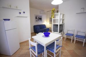 A kitchen or kitchenette at Appartamenti Bilo Sofi