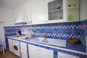 Кухня или мини-кухня в Appartamenti Bilo Sofi
