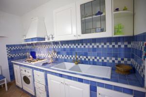A kitchen or kitchenette at Appartamenti Bilo Sofi