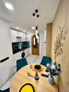 Kuchyň nebo kuchyňský kout v ubytování Elegante Apartamento TRES COLORES