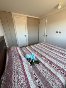 เตียงในห้องที่ Hermoso departamento en Viña del Mar