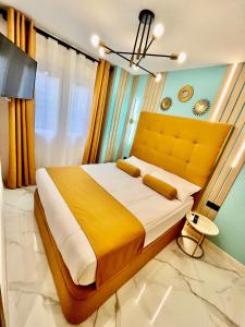 Postel nebo postele na pokoji v ubytování Elegante Apartamento TRES COLORES