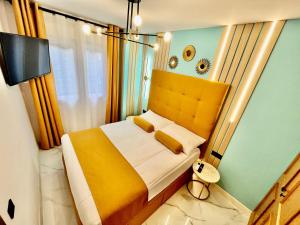 Postel nebo postele na pokoji v ubytování Elegante Apartamento TRES COLORES