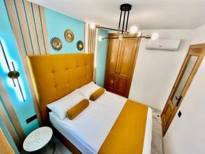 Postel nebo postele na pokoji v ubytování Elegante Apartamento TRES COLORES