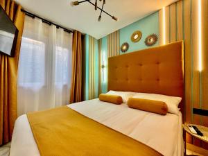 Postel nebo postele na pokoji v ubytování Elegante Apartamento TRES COLORES