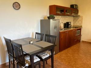 Kuchyň nebo kuchyňský kout v ubytování Apartment Diamond Hill Resort