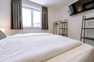 Posteľ alebo postele v izbe v ubytovaní Apart Peak Ötztal + 29 fotografií