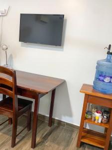 TV a/nebo společenská místnost v ubytování The Ansen Place
