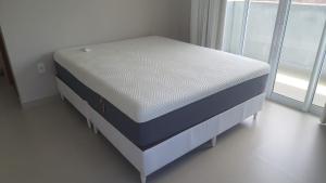 Giường trong phòng chung tại Casa Entre Verde e Mar Praia do Mariscal +30 ảnh