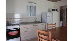 Η κουζίνα ή μικρή κουζίνα στο San José Bungalows