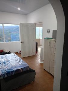 Postel nebo postele na pokoji v ubytování Praia 2