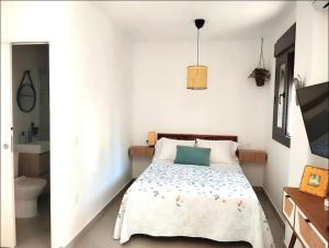 Postel nebo postele na pokoji v ubytování Estudio Alamillo 1