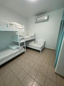 Postel nebo postele na pokoji v ubytování للعائلات - Blue شاليهات + 9 fotografií