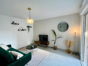 Posezení v ubytování Joli appartement lumineux et calme