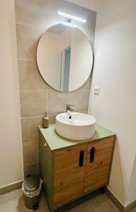 Koupelna v ubytování Joli appartement lumineux et calme + 9 fotografií