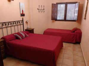 Posteľ alebo postele v izbe v ubytovaní CASAS RURALES HOZ DEL JUCAR