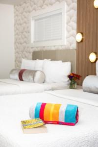 Ένα ή περισσότερα κρεβάτια σε δωμάτιο στο Seaway Inn