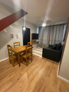 TV a/nebo společenská místnost v ubytování Duplex - Unidade Jardins + 11 fotografií